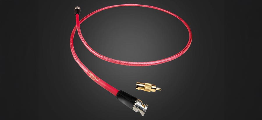 Heimdall 2 digital coaxial cable with gold-plated connectors coiled on a dark background